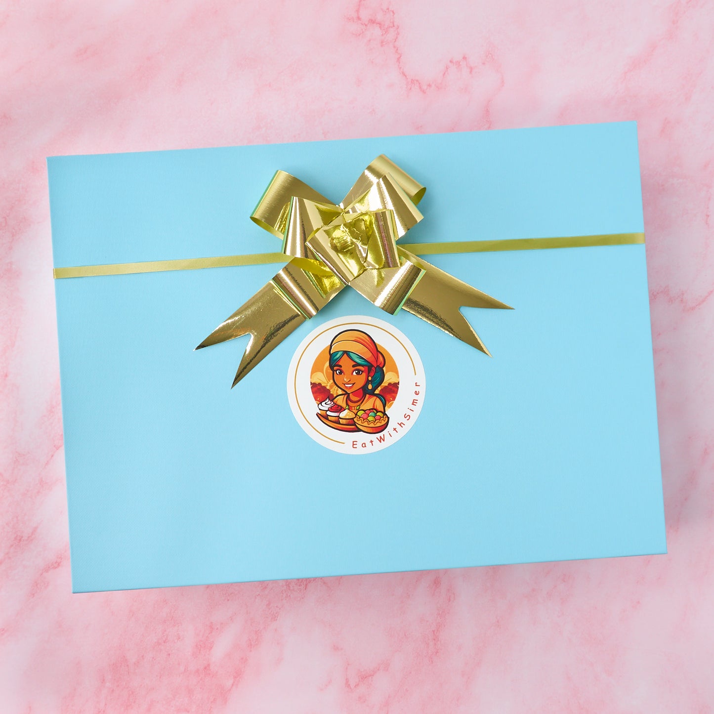 Shagun Indian gift hamper in blue keepsake magnetic box with golden ribbon