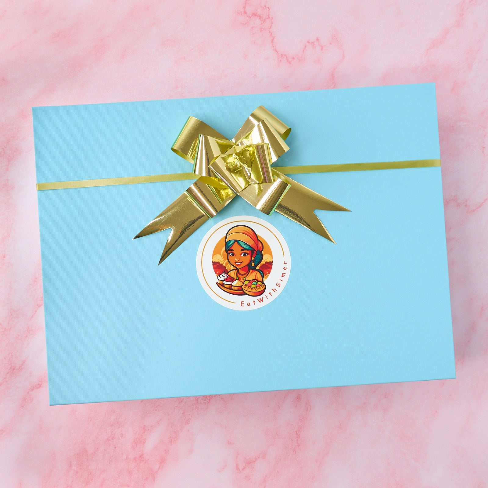 Shagun Indian gift hamper in blue keepsake magnetic box with golden ribbon