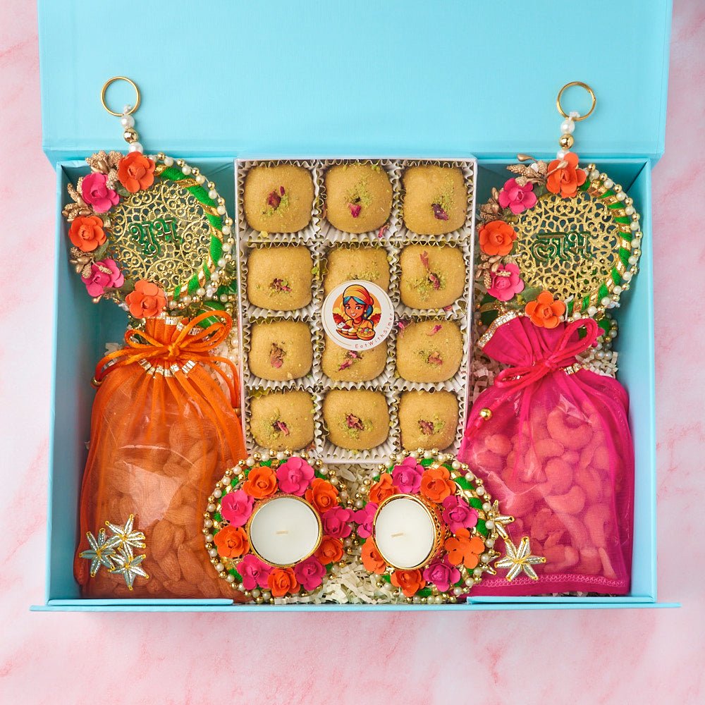 Shagun Indian gift hamper with laddoos, roasted nuts, handmade diyas and Shubh Labh wall hangings