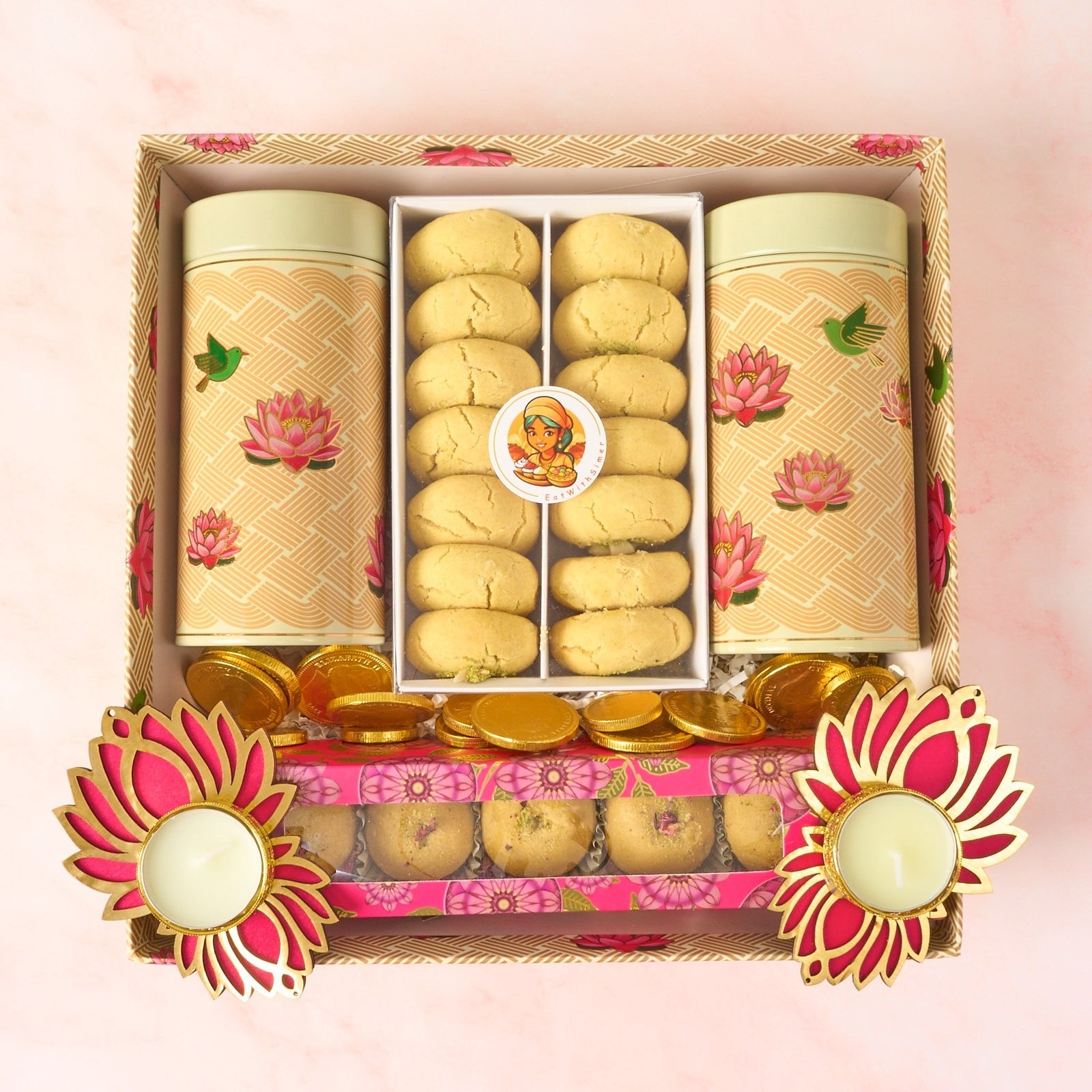 Uphaar premium Indian sweets gift tray with besan laddoos, nankhatai, roasted nuts and lotus diyas