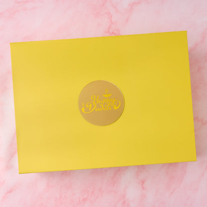 Matte yellow Diwali gift hamper box with acrylic Happy Diwali charm