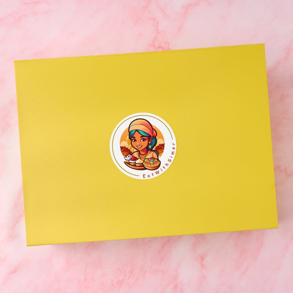 Yellow keepsake magnetic gift box with EatWithSimer sticker